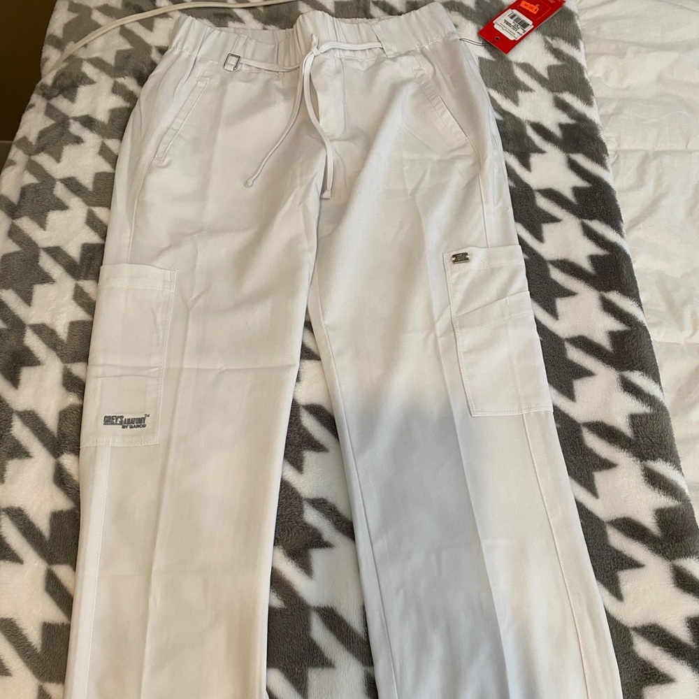 White scrubs , bottoms size XS , top size S